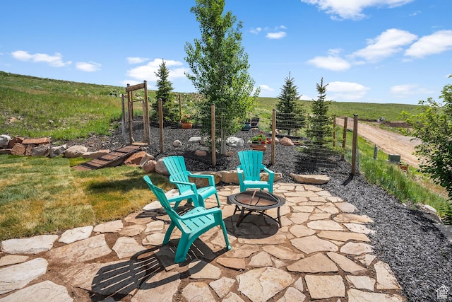 359 Parkview Rd, Coalville, UT 84017 - view of patio / terrace with a fire pit, a view of rural / pastoral area, and agricultural plots