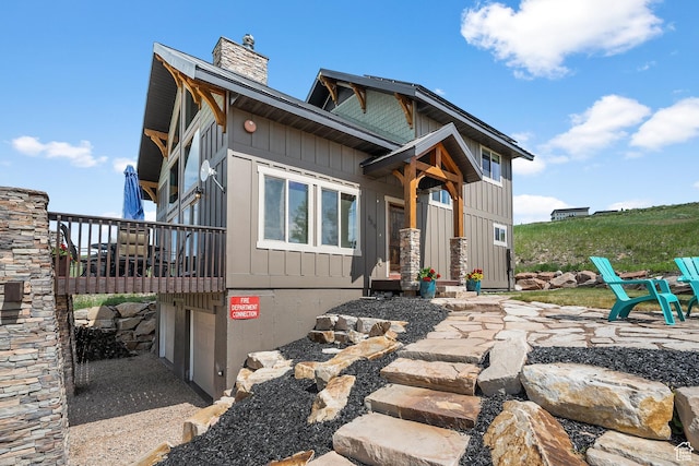 359 Parkview Rd, Coalville, UT 84017 - view of front of home with a chimney, a balcony, and board and batten siding