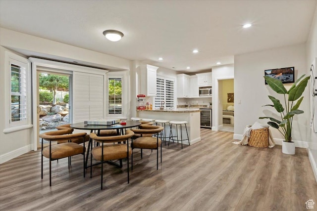 1784 E Ellerbeck Ln, Draper, UT 84020 - dining room featuring light wood-type flooring, baseboards, and recessed lighting
