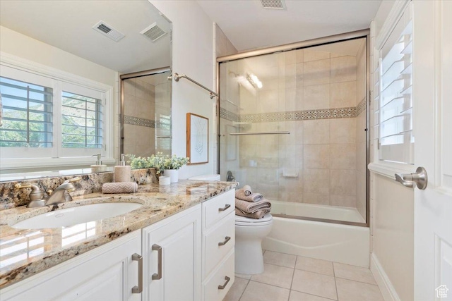 1784 E Ellerbeck Ln, Draper, UT 84020 - bathroom featuring tile patterned flooring, vanity, toilet, combined bath / shower with glass door, and baseboards