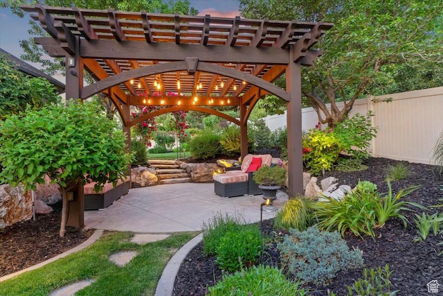 1784 E Ellerbeck Ln, Draper, UT 84020 - patio terrace at dusk with a pergola and a patio