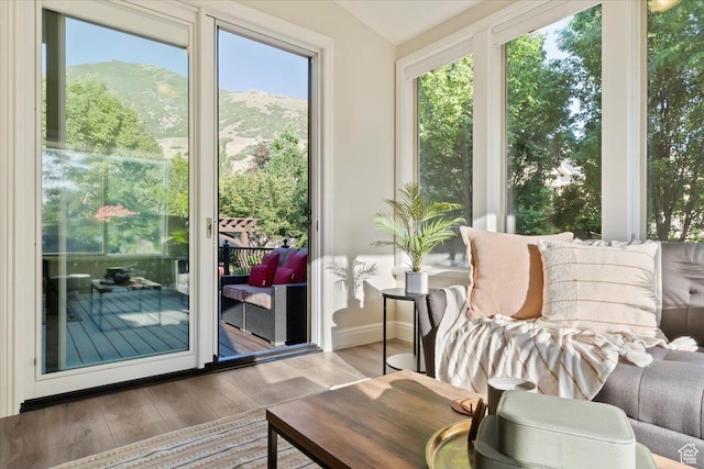 1784 E Ellerbeck Ln, Draper, UT 84020 - sunroom / solarium featuring healthy amount of natural light, wood finished floors, lofted ceiling, and baseboards