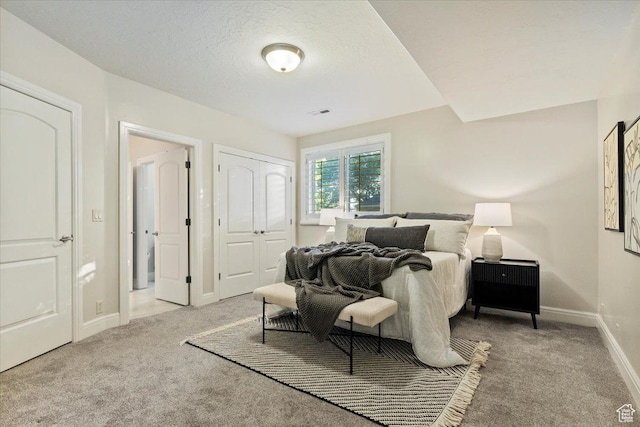 1784 E Ellerbeck Ln, Draper, UT 84020 - carpeted bedroom with baseboards, a closet, and a textured ceiling