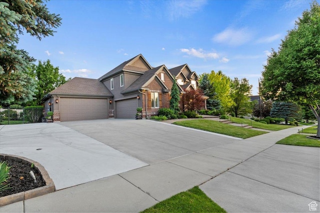 1784 E Ellerbeck Ln, Draper, UT 84020 - view of front of house with an attached garage, concrete driveway, and brick siding