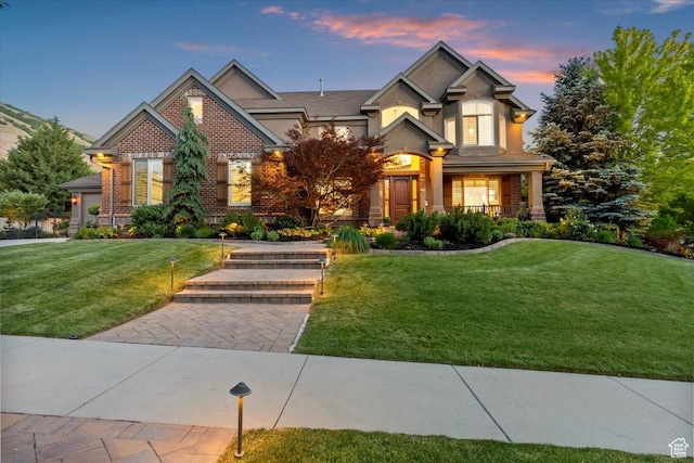 1784 E Ellerbeck Ln, Draper, UT 84020 - view of front of house with a front lawn and brick siding