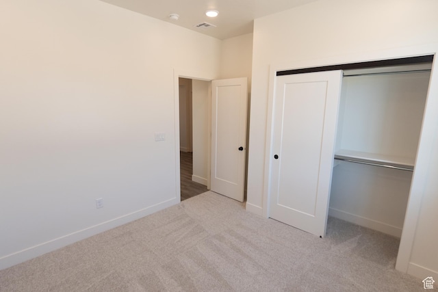 336 W Rosie Loop Unit 45W, Cedar City, UT 84721 - unfurnished bedroom featuring carpet floors and a closet