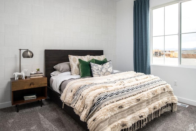 4286 W 1600 S Unit 301, Ogden, UT 84404 - carpeted bedroom with multiple windows and baseboards