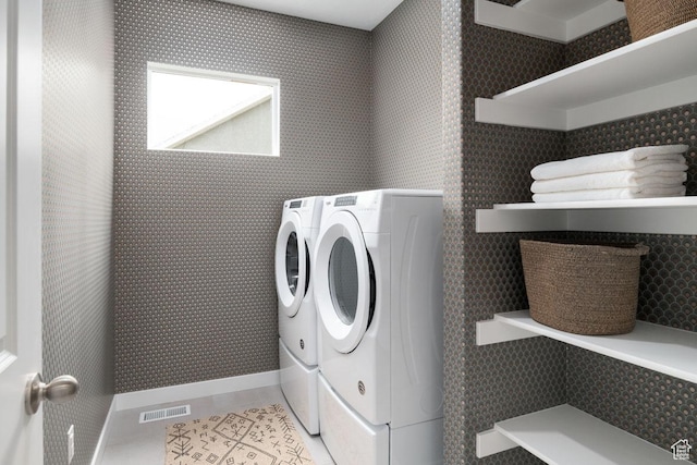 4286 W 1600 S Unit 301, Ogden, UT 84404 - laundry area featuring separate washer and dryer and light tile patterned flooring