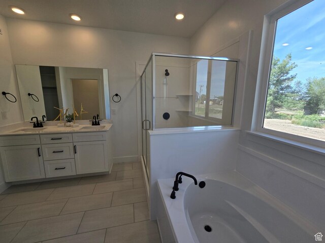 4286 W 1600 S Unit 301, Ogden, UT 84404 - full bathroom with a bath, a shower stall, double vanity, tile patterned floors, and recessed lighting