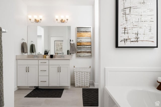 4286 W 1600 S Unit 301, Ogden, UT 84404 - full bathroom with double vanity, a garden tub, baseboards, and tile patterned flooring