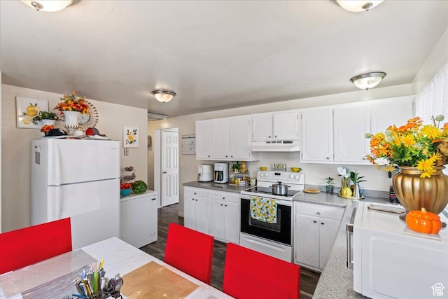 3230 W 4700 S, Salt Lake City, UT 84128 - kitchen featuring white appliances, under cabinet range hood, white cabinetry, and dark wood finished floors