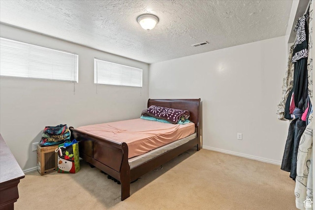 3230 W 4700 S, Salt Lake City, UT 84128 - bedroom featuring carpet, a textured ceiling, and baseboards