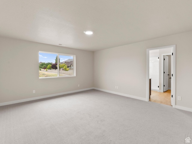 1597 N Cozy Ln Unit 14, Saratoga Springs, UT 84045 - empty room featuring light colored carpet and baseboards