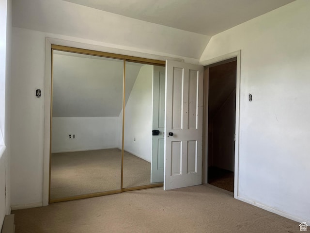 396 W 400 N, Manti, UT 84642 - unfurnished bedroom with vaulted ceiling, carpet, and a closet