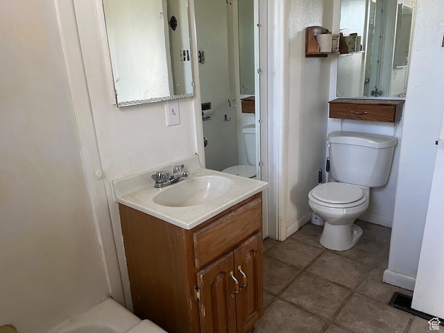396 W 400 N, Manti, UT 84642 - bathroom with toilet, vanity, tile patterned floors, and baseboards