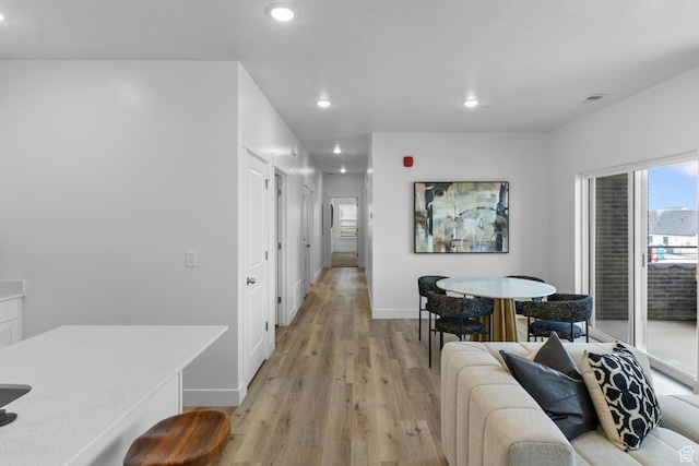 3085 S 225 W Unit G102, Nibley, UT 84321 - dining space featuring recessed lighting, light wood-style floors, and baseboards