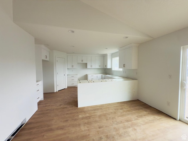 572 S 1340 E, Payson, UT 84651 - kitchen with wood finished floors, baseboard heating, white cabinets, lofted ceiling, and recessed lighting