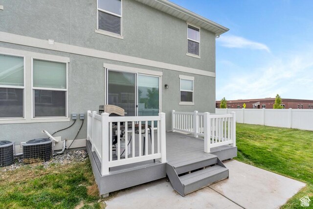 873 S Sunflower Ln W, Mapleton, UT 84664 - rear view of house featuring central air condition unit, a wooden deck, and stucco siding