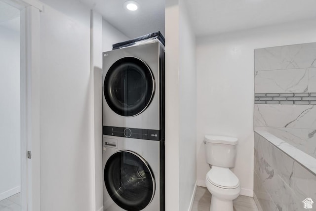 873 S Sunflower Ln W, Mapleton, UT 84664 - laundry room featuring stacked washing machine and dryer, baseboards, and recessed lighting