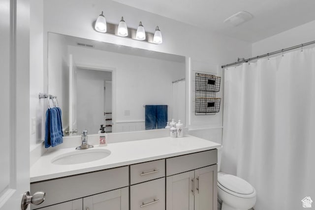 873 S Sunflower Ln W, Mapleton, UT 84664 - bathroom with vanity, toilet, and a shower with curtain