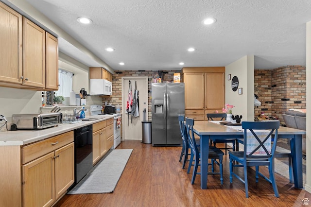 383 N 835 E, Lindon, UT 84042 - kitchen featuring white appliances, a textured ceiling, wood finished floors, a sink, and light countertops