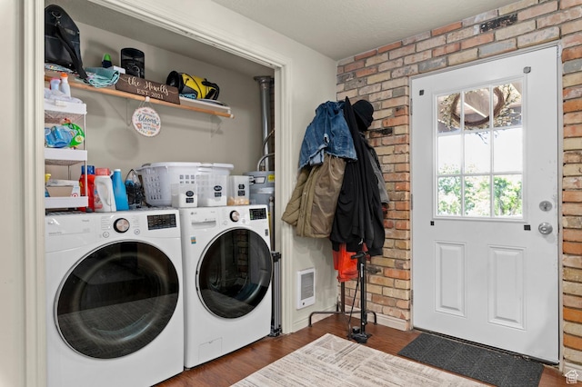 383 N 835 E, Lindon, UT 84042 - laundry room with washing machine and dryer, brick wall, and dark wood-style flooring
