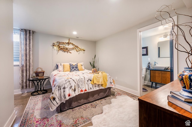 1130 S 1300 E, Salt Lake City, UT 84105 - bedroom featuring recessed lighting, finished concrete flooring, and ensuite bath