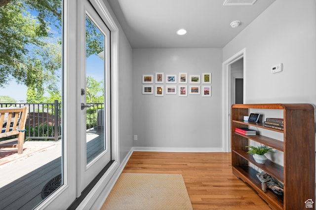 1130 S 1300 E, Salt Lake City, UT 84105 - doorway to outside with wood finished floors and baseboards