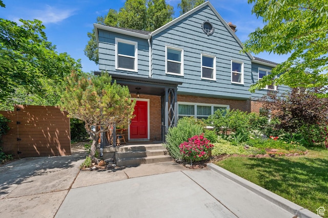1130 S 1300 E, Salt Lake City, UT 84105 - traditional-style house featuring brick siding