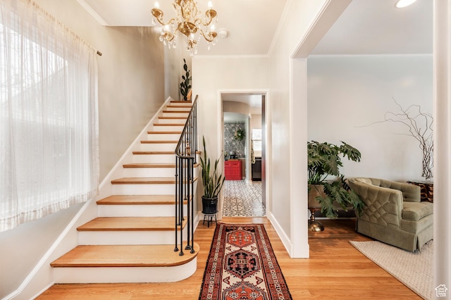 1130 S 1300 E, Salt Lake City, UT 84105 - stairs with wood finished floors, crown molding, and a chandelier