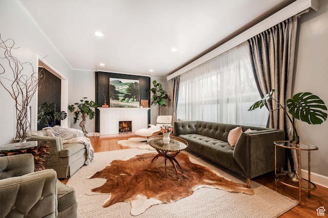 1130 S 1300 E, Salt Lake City, UT 84105 - living room featuring wood finished floors, a brick fireplace, recessed lighting, and ornamental molding