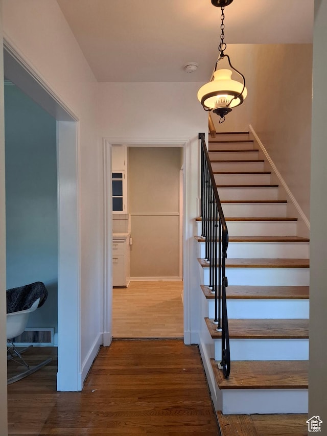 1130 S 1300 E, Salt Lake City, UT 84105 - stairs featuring wood finished floors and baseboards