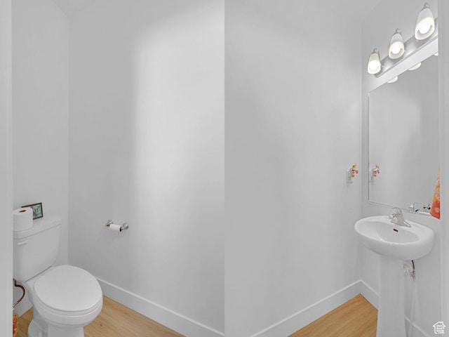 1230 W 1820 S, Logan, UT 84321 - half bath with wood finished floors, toilet, and baseboards