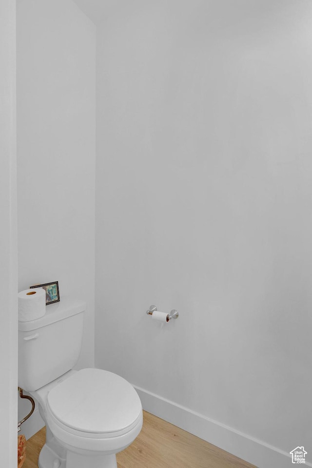 1230 W 1820 S, Logan, UT 84321 - bathroom with baseboards, toilet, and wood finished floors