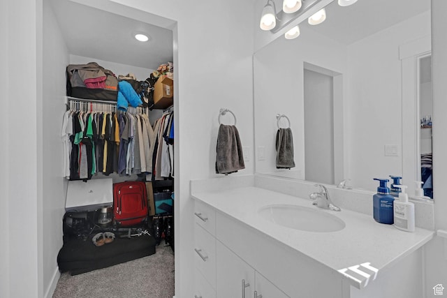 1230 W 1820 S, Logan, UT 84321 - bathroom with vanity and a spacious closet