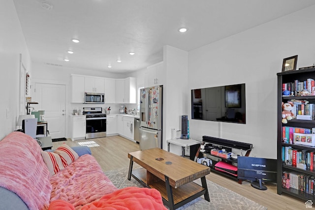 1230 W 1820 S, Logan, UT 84321 - living area with light wood-style flooring and recessed lighting