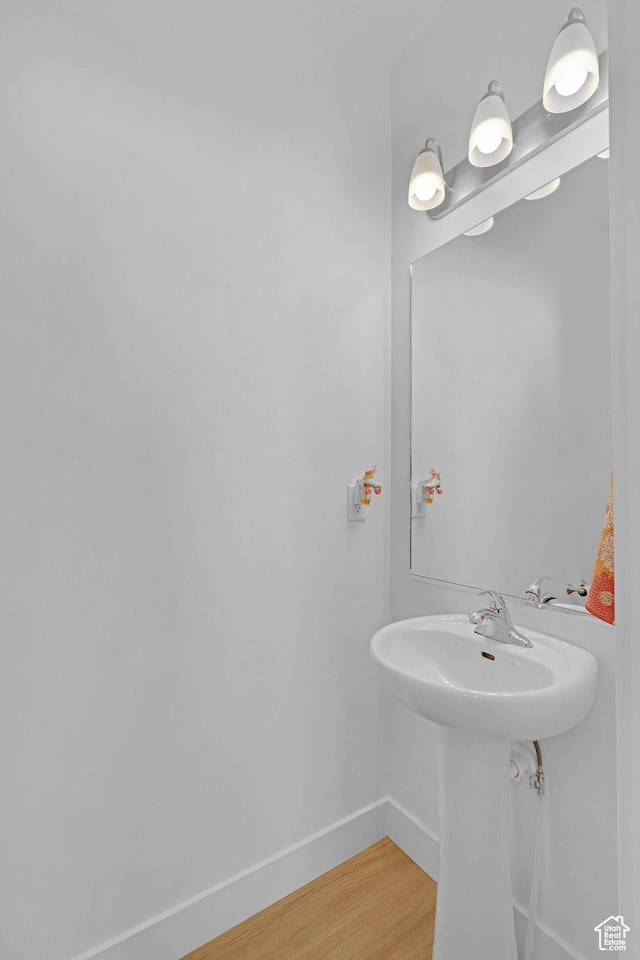 1230 W 1820 S, Logan, UT 84321 - bathroom featuring wood finished floors and baseboards