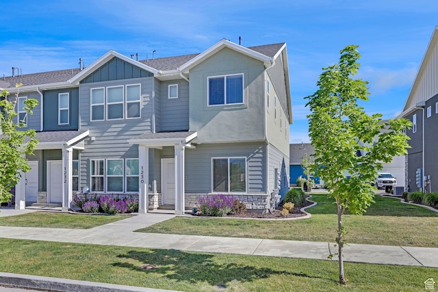 1230 W 1820 S, Logan, UT 84321 - view of front of house featuring a front yard and board and batten siding