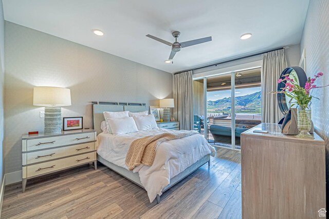 11517 N Perspective Dr, Hideout, UT 84036 - bedroom featuring access to exterior, wood finished floors, ceiling fan, recessed lighting, and baseboards