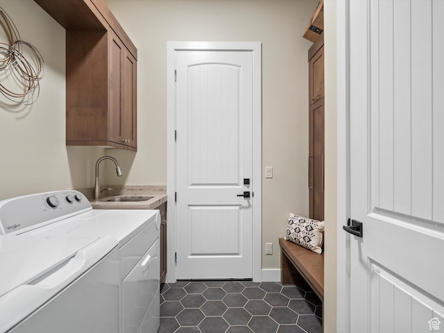 5943 E Big Horn Pkwy, Eden, UT 84310 - laundry room with cabinet space, washing machine and dryer, and dark tile patterned floors
