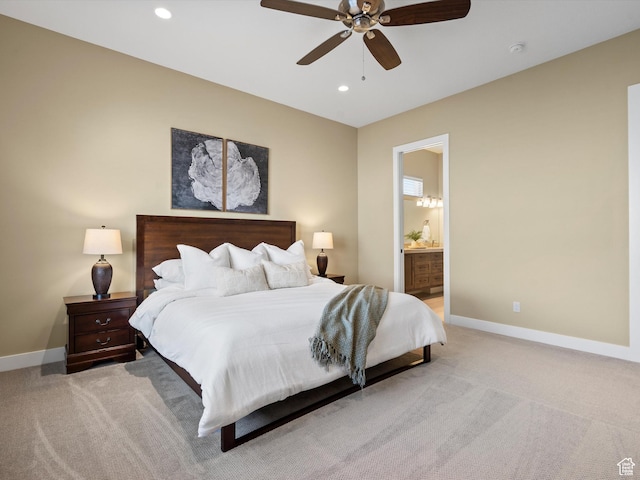 5943 E Big Horn Pkwy, Eden, UT 84310 - bedroom with light carpet, recessed lighting, baseboards, connected bathroom, and a ceiling fan