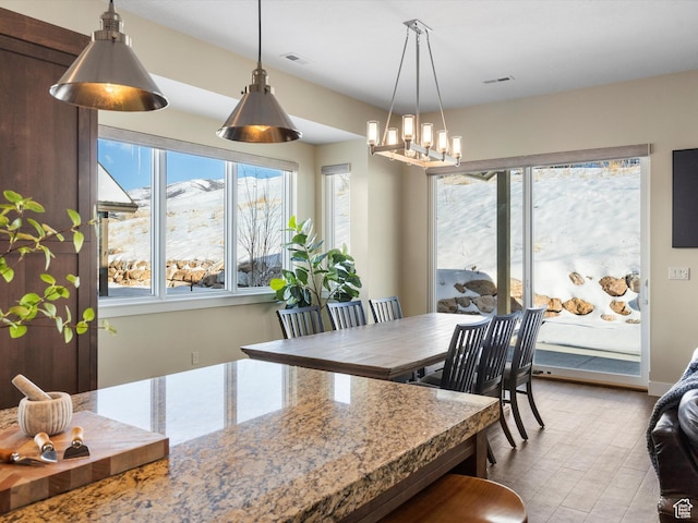 5943 E Big Horn Pkwy, Eden, UT 84310 - dining room with a chandelier