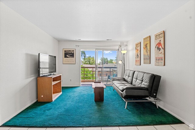 207 S 600 E Unit 3C, Salt Lake City, UT 84102 - living room featuring baseboards and carpet flooring