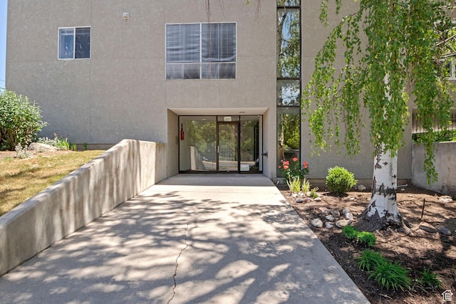207 S 600 E Unit 3C, Salt Lake City, UT 84102 - doorway to property with stucco siding