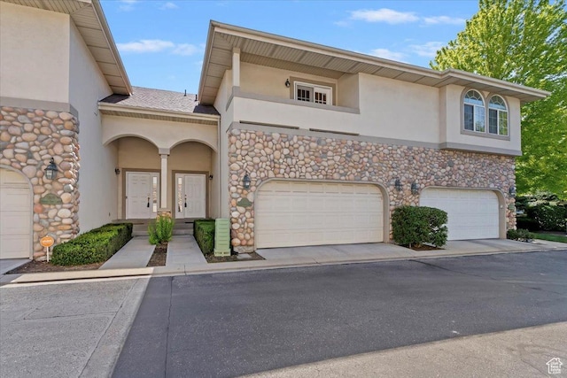 7825 S Spruce Tree Ln, Sandy, UT 84094 - view of property with stucco siding and stone siding