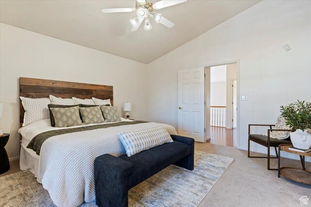 7825 S Spruce Tree Ln, Sandy, UT 84094 - bedroom featuring light colored carpet, high vaulted ceiling, and ceiling fan