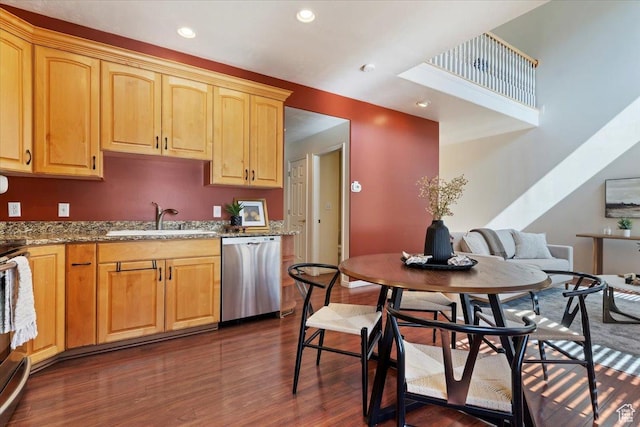 7825 S Spruce Tree Ln, Sandy, UT 84094 - kitchen with dishwasher, a sink, dark wood-style flooring, light stone countertops, and recessed lighting