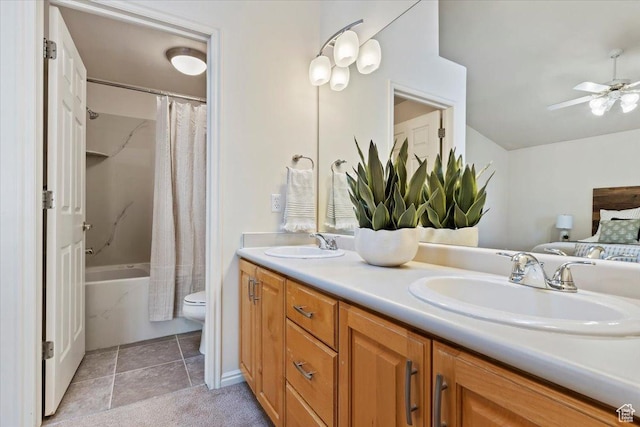 7825 S Spruce Tree Ln, Sandy, UT 84094 - bathroom with double vanity, shower / tub combo with curtain, a ceiling fan, toilet, and tile patterned flooring