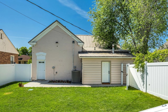 119 E 400 S, Provo, UT 84606 - back of property with central air condition unit, brick siding, and metal roof