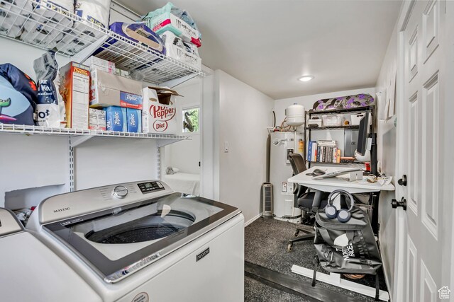 119 E 400 S, Provo, UT 84606 - laundry area with electric water heater, washer and dryer, and baseboards